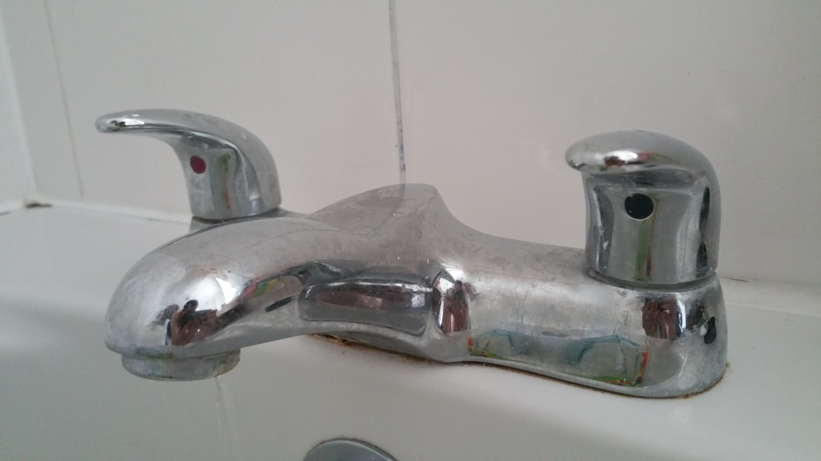 bathroom sink tap dripping