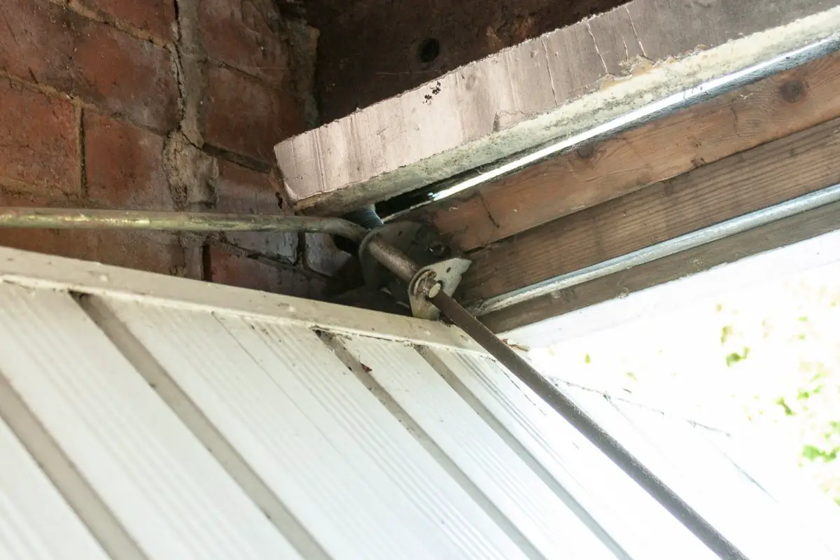 Minimalist Up And Over Garage Door Cable Jammed with Electrical Design