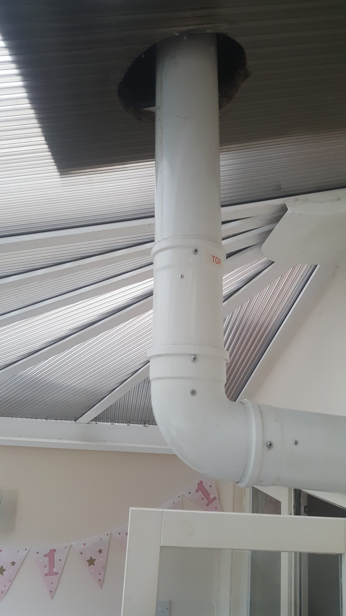 Flue in conservatory with box above (leaking)